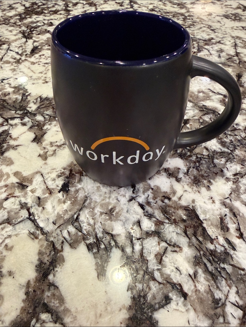 Workday 14 fl oz Black Ceramic Coffee Mug Blue Interior Logo